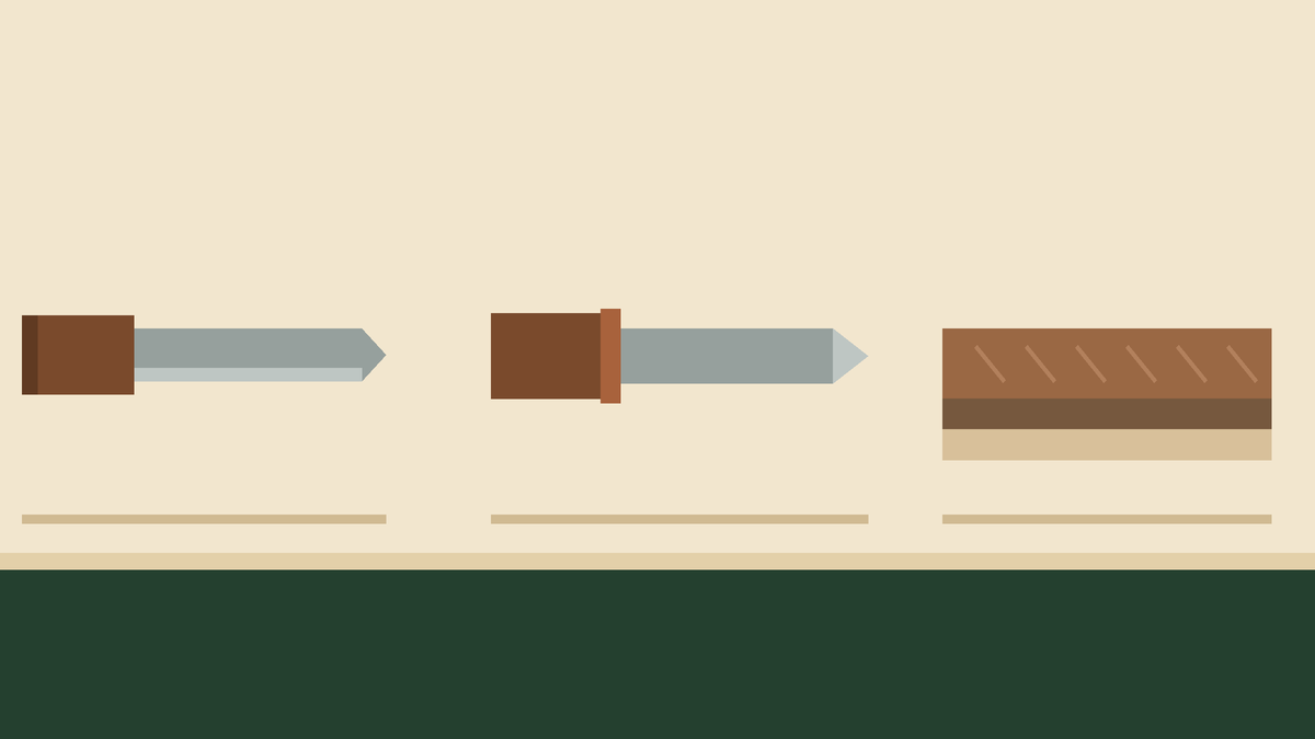 A sloyd knife, a shallow gouge and a leather strop laid out in a row